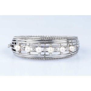 58 FACETTES Bracelet  Bracelet demi-jonc perles diamants en or gris - Publicité