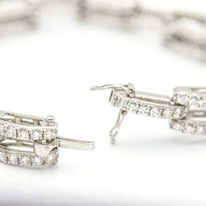 58 FACETTES Bracelet  Bracelet en Or et Diamants. Tout neuf - Publicité