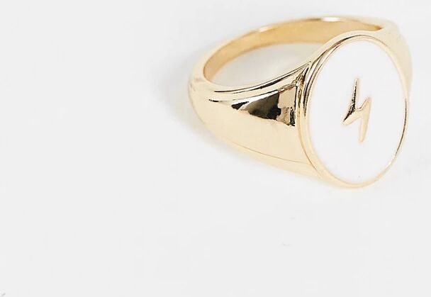 Accessorize Exclusive signet ring with lightning bolt in gold and pink  Gold