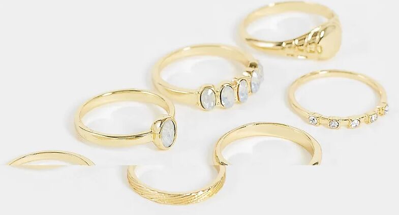 ASOS DESIGN pack of 7 rings in mixed crystal design in gold tone  Gold