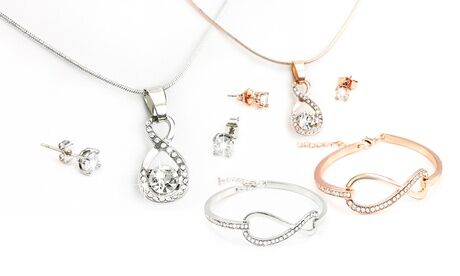 Groupon Goods Global GmbH One or Two Infinity Pendant or Blacelet with Earrings Sets Made with Crystals from Swarovski®