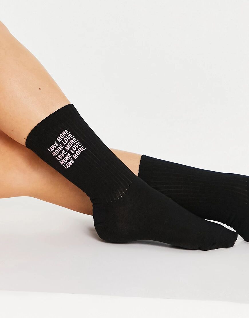 ASOS DESIGN slogan embroidered calf length rib socks in black  Black