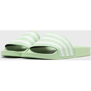 Adidas WMNS ADILETTE women Sandals & Slides green en taille:38 - Publicité