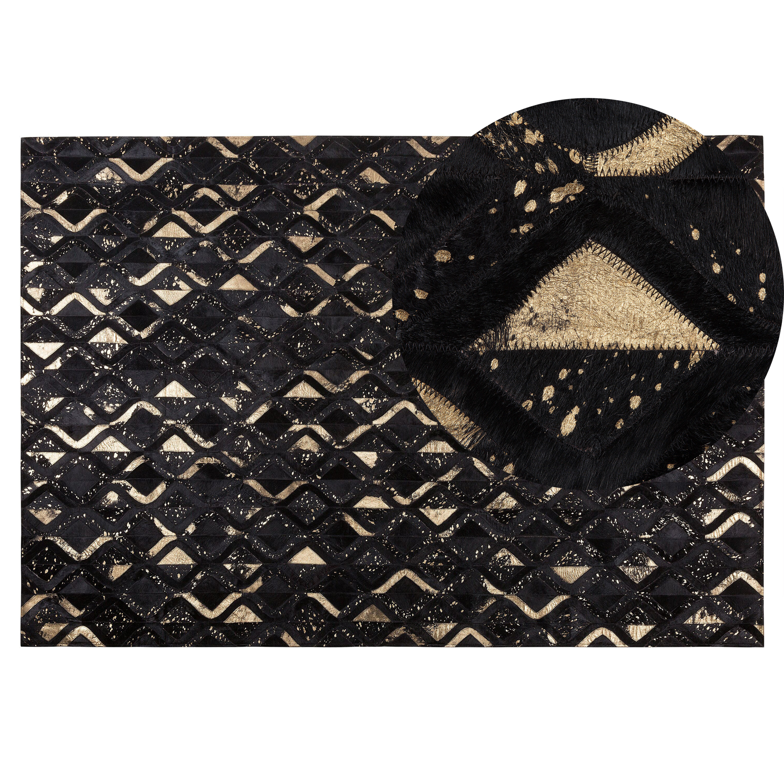 Beliani Černo-zlatý kožený koberec 140x200 cm DEVELI