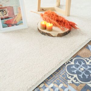 200x290 Tapis doux poils longs - Touch beige clair - Galon blanc coton