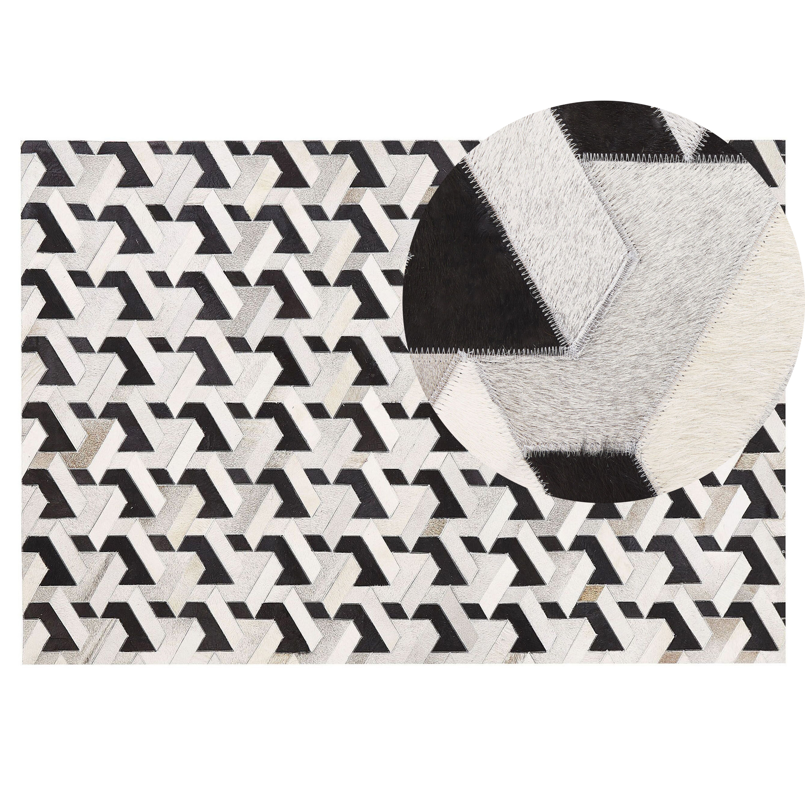 Beliani Area Rug Black and White Cowhide Leather 140 x 200 cm Geometric Pattern Patchwork