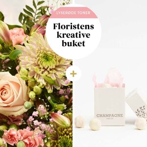 Interflora Floristens kreative buket i lyserøde nuancer med champagnetrøfler