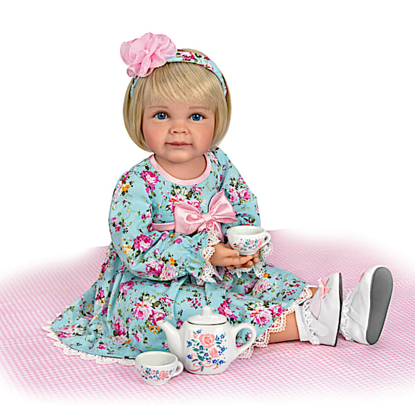 The Ashton-Drake Galleries Toddler Doll With Porcelain Tea Set Is Perfect For Posing