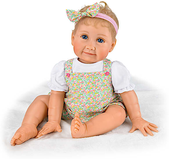 The Ashton-Drake Galleries Sugar And Spice Poseable Lifelike Baby Girl Doll