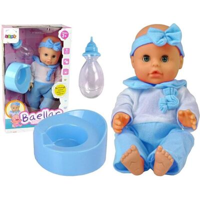 Lean Toys Eine Puppe im blauen Schlafanzug trinkt, eine Flasche, ein Töpfchen Lean Toys Eine Puppe im blauen Schlafanzug trinkt, eine Flasche, ein Töpfchen