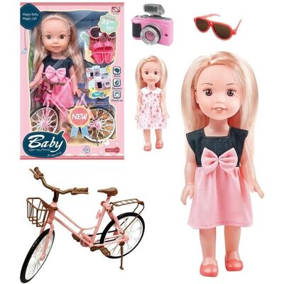 Trifox Eine Mädchenpuppe mit einem Fahrrad Trifox Eine Mädchenpuppe mit einem Fahrrad