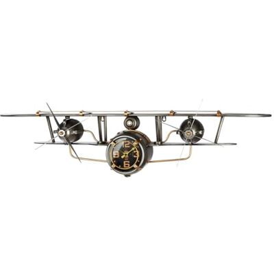 GILDE Horloge murale en métal Finition antique Argenté Hauteur 25 cm x largeur 106 cm Forme d'avion GILDE Horloge murale en métal Finition antique Argenté Hauteur 25 cm x largeur 106 cm Forme d'avion