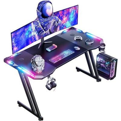 HLONONE Bureau Gaming avec LED, 120 x 60 cm, Structure Robuste en Z, Noir Bureau d'ordinateur avec Porte-gobelet, Porte-écouteurs et deux Cache-câbles, Adapté au Gaming ou au Travail HLONONE Bureau Gaming avec LED, 120 x 60 cm, Structure Robuste en Z, Noir Bureau d'ordinateur avec Porte-gobelet, Porte-écouteurs et deux Cache-câbles, Adapté au Gaming ou au Travail