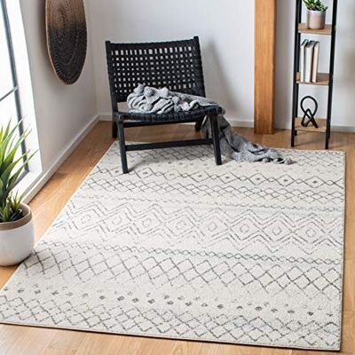 SAFAVIEH Tapis moderne et chic pour salon, salle à manger, chambre à coucher Collection Madison Poils courts Ivoire et anthracite 122 x 183 cm SAFAVIEH Tapis moderne et chic pour salon, salle à manger, chambre à coucher Collection Madison Poils courts Ivoire et anthracite 122 x 183 cm