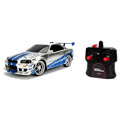 Jada Fast&Furious Voiture RC 2002 Nissan Skyline GT-R 1:16 (Radiocontrol avec commande) Blanc/Bleu (253206007) Jada Fast&Furious Voiture RC 2002 Nissan Skyline GT-R 1:16 (Radiocontrol avec commande) Blanc/Bleu (253206007)