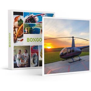 Vol époustouflant de 20 min en hélicoptère dans un Robinson R44 pour 3 personnes Vol époustouflant de 20 min en hélicoptère dans un Robinson R44 pour 3 personnes