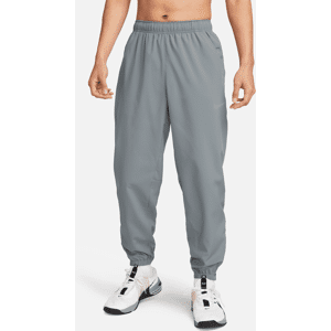 Nike FormVielseitige Hose mit schmal zulaufender Passform und für Herren - Grau - XL