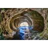 Papermoon Fototapete »GROTTE-NEUSEELAND HÖHLE STROM BERGE MEER FLUSS FELSEN« bunt  B/L: 5,00 m x 2,80 m