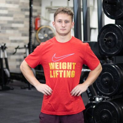 Pánské tričko Nike Weightlifting Big Swoosh - red-gold XL Pánské tričko Nike Weightlifting Big Swoosh - red-gold XL