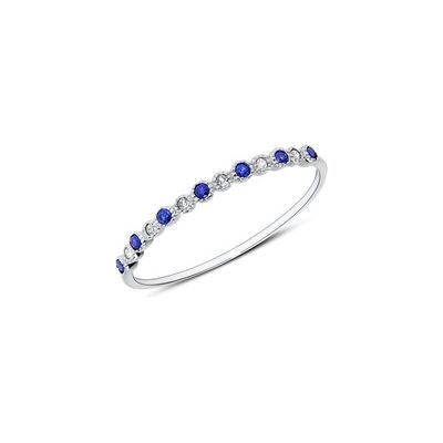 Unique Ring aus 585er Weißgold mit Saphiren und Weißtopasen Unique Ring aus 585er Weißgold mit Saphiren und Weißtopasen