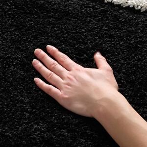 Safavieh Zottelig Teppich für Wohnzimmer, Esszimmer, Schlafzimmer Florida Shag Collection, Hoher Flor, Schwarz und Elfenbein, 122 X 183 cm Safavieh Zottelig Teppich für Wohnzimmer, Esszimmer, Schlafzimmer Florida Shag Collection, Hoher Flor, Schwarz und Elfenbein, 122 X 183 cm