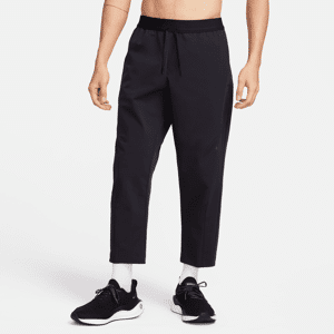 Nike A.P.S. Vævede, alsidige Dri-FIT-bukser til mænd - sort sort M