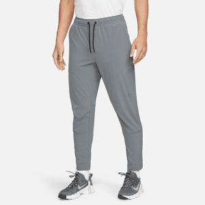Alsidige Nike Unlimited-Dri-FIT-bukser med lynlåsmanchetter til mænd - grå grå XXL