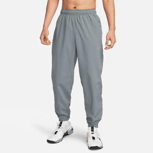 Faconsyede, alsidige Nike Form Dri-FIT-bukser til mænd - grå grå L