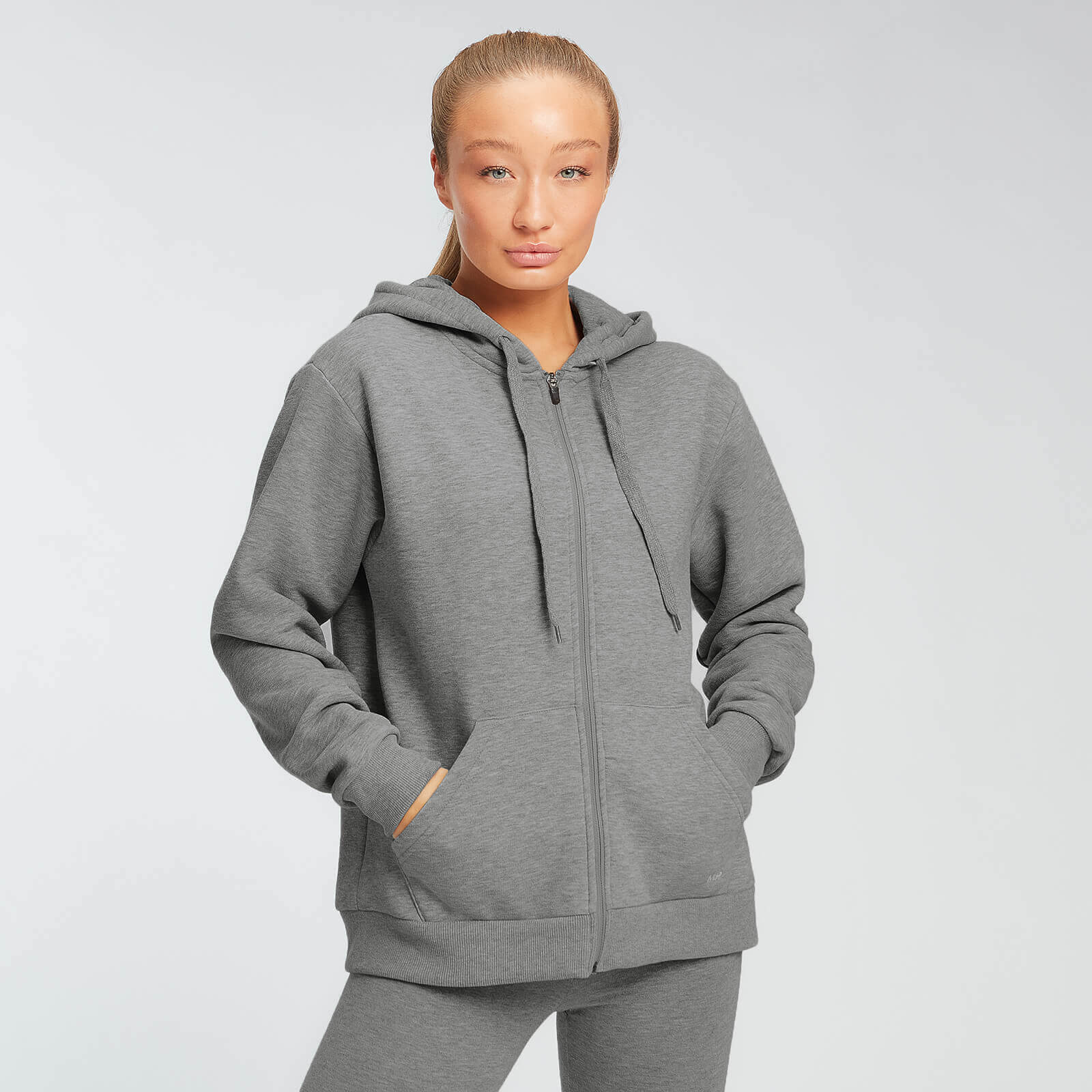 Myprotein Sudadera con capucha y cremallera integral Essentials para mujer de MP - Gris jaspeado - S Myprotein Sudadera con capucha y cremallera integral Essentials para mujer de MP - Gris jaspeado - S