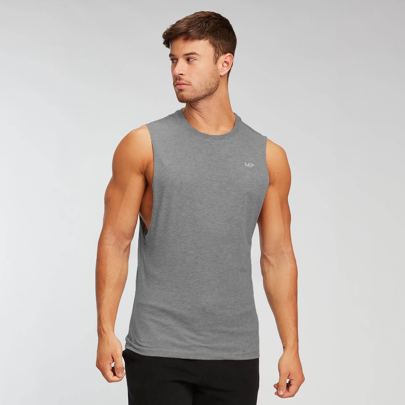 Myprotein Camiseta sin mangas con sisas caídas Essentials para hombre de MP - Gris jaspeado - M Myprotein Camiseta sin mangas con sisas caídas Essentials para hombre de MP - Gris jaspeado - M