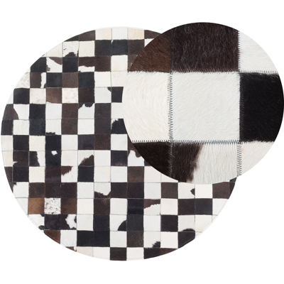 BELIANI Alfombra Redonda De Piel Negra Y Blanca Ø 140 Cm Patchwork Elaborada A Mano Bergama BELIANI Alfombra Redonda De Piel Negra Y Blanca Ø 140 Cm Patchwork Elaborada A Mano Bergama