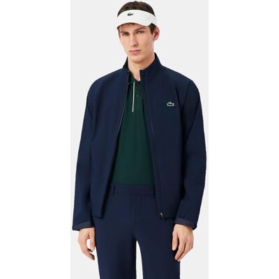 Lacoste Cortavientos de hombre de golf elástico hidrófugo en azul de manga larga. (48) Azul marino Lacoste Cortavientos de hombre de golf elástico hidrófugo en azul de manga larga. (48) Azul marino