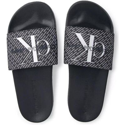 Calvin Klein Chanclas Slide Aop Negras Ym0ym00955 Negro Talla 42 Calvin Klein Chanclas Slide Aop Negras Ym0ym00955 Negro Talla 42