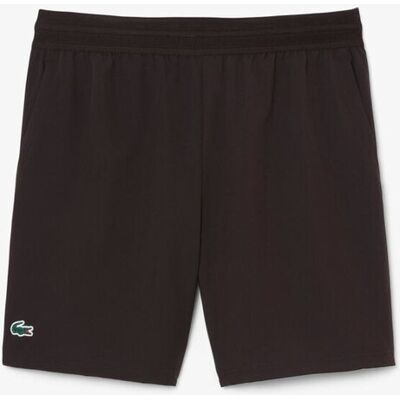 Lacoste Pantalón de hombre corto de tenis elástico Ultra-Dry. (46) Marrón Lacoste Pantalón de hombre corto de tenis elástico Ultra-Dry. (46) Marrón