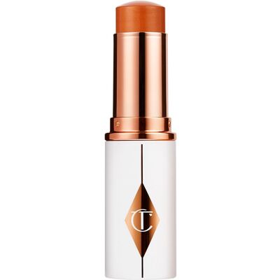 Charlotte Tilbury Unreal Skin Sheer Glow Tint - 12.5 Tan - Base en barra Charlotte Tilbury Unreal Skin Sheer Glow Tint - 12.5 Tan - Base en barra