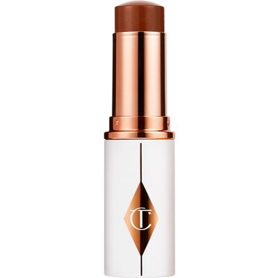 Charlotte Tilbury Unreal Skin Sheer Glow Tint en 15 Deep - Barra de base Charlotte Tilbury Unreal Skin Sheer Glow Tint en 15 Deep - Barra de base