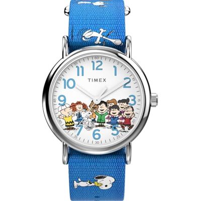 Timex Peanuts Reloj con correa de tela azul con esfera blanca y caja plateada para mujer, 38 mm Timex Peanuts Reloj con correa de tela azul con esfera blanca y caja plateada para mujer, 38 mm
