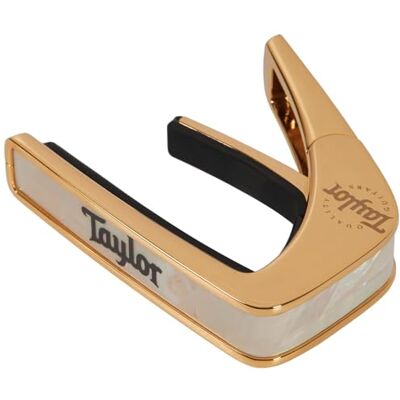 Thalia Taylor by Cejilla con acabado dorado, nácar blanco con logotipo de Taylor negro Thalia Taylor by Cejilla con acabado dorado, nácar blanco con logotipo de Taylor negro