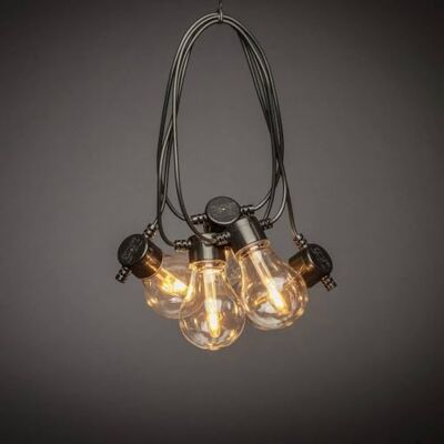 Konstsmide Cadena solar led para jardín de cerveza (mando a distancia, 10 diodos de color ámbar, cable negro, 2 baterías de litio, 1 CR2025 incluidas), color ámbar Konstsmide Cadena solar led para jardín de cerveza (mando a distancia, 10 diodos de color ámbar, cable negro, 2 baterías de litio, 1 CR2025 incluidas), color ámbar