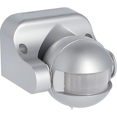 Unitec Detector de Movimiento de 180°, para lámparas de hasta 1200 W, para Interior y Exterior, IP 44, Alcance de 12 m, Cabezal esférico inclinable, Color Plateado Unitec Detector de Movimiento de 180°, para lámparas de hasta 1200 W, para Interior y Exterior, IP 44, Alcance de 12 m, Cabezal esférico inclinable, Color Plateado