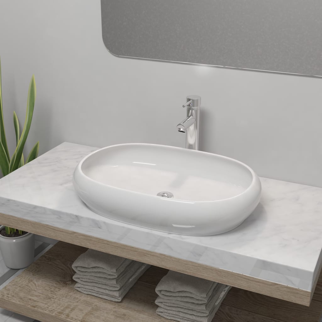 vidaXL Lavabo de baño ovalado con grifo mezclador cerámica blanco