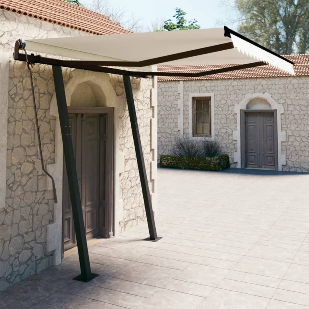 vidaXL Toldo manual retráctil con postes crema 3x2,5 m