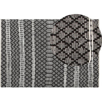 Beliani Nahkamatto 140 x 200 cm Musta beigen kanssa - Moderni Nykytaiteellinen Käsi Kudottu Beliani Nahkamatto 140 x 200 cm Musta beigen kanssa - Moderni Nykytaiteellinen Käsi Kudottu