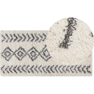 Beliani Vaalea beige harmaa matto 80x150cm - Geometrinen kuvio Boho-tyyli Beliani Vaalea beige harmaa matto 80x150cm - Geometrinen kuvio Boho-tyyli