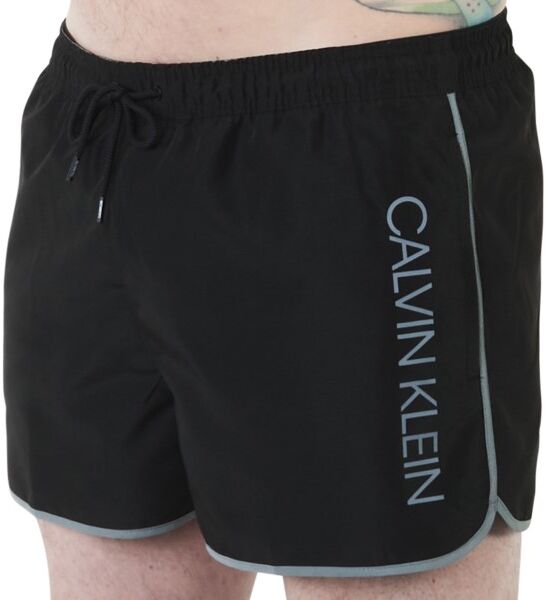 Calvin Klein Core Solid Short Runner Swim Shorts - Black  - Size: KM0KM00571 - Color: musta Calvin Klein Core Solid Short Runner Swim Shorts - Black  - Size: KM0KM00571 - Color: musta