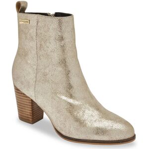 Coup de coeur pour cette superbe paire de boots Les Tropéziennes par M Belarbi® plus lumineuse que jamais. On aime son look doré, son talon effet bois élégant, son enfilage facile et sa confection cuir,... parfaite pour vous sublimer au quotidien. image