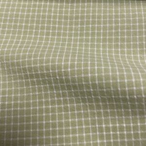 Mondial Tissus - coton-polyester tissu vert clair à petits carreaux - Publicité Mondial Tissus - coton-polyester tissu vert clair à petits carreaux - Publicité