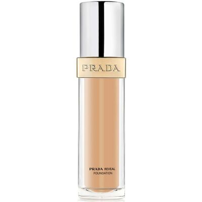 Prada Reveal Skin Fond de Teint - Moyen Chaud - Rechargeable - Publicité Prada Reveal Skin Fond de Teint - Moyen Chaud - Rechargeable - Publicité