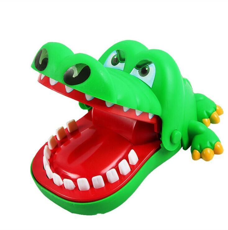 Jeu classique de la famille, et un grand jouet pour vos enfants. Chaque fois que vous ouvrez la bouche du crocodile une dent aléatoire deviendra interrupteur de sa bouche. Nom du produit: crocodile fou tirant des dents - Bar Games ToysMatériau: plastique non toxique. Taille: 15.5 * 13.5 * 8CM. image