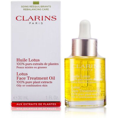 Huile Lotus - Clarins Soin hydratant et nourrissant 30 ml - Publicité Huile Lotus - Clarins Soin hydratant et nourrissant 30 ml - Publicité